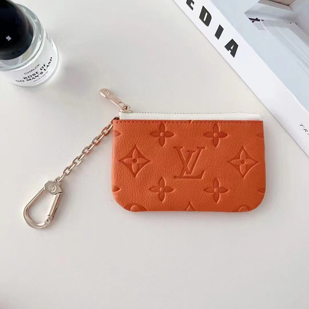 Colorful Lou-Inspired Embossed Coin Pouch Collection with Chain Clip