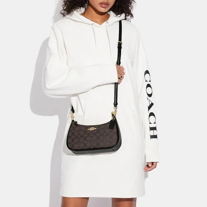 Teri Shoulder Bag In Signature Canvas in Brown