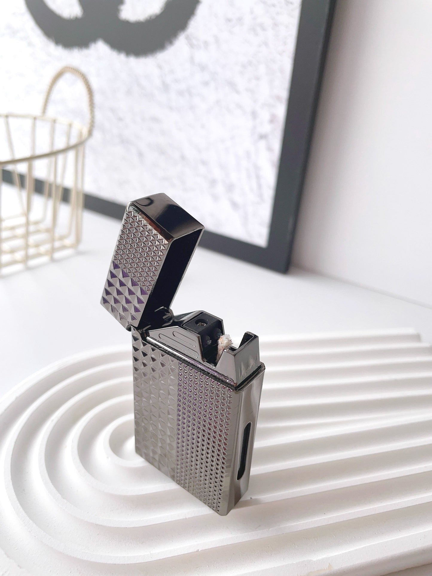 A lighter with four intelligent ignition methods: voice control, air flow, gravity, and strike.