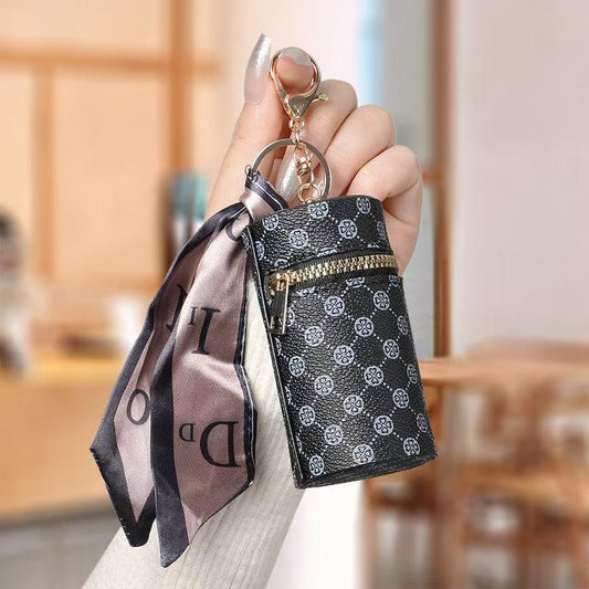 Lipstick holder.Key ring